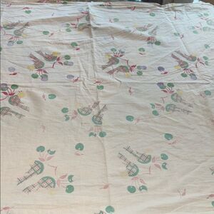 Vintage crib sheet with birds and cherries
